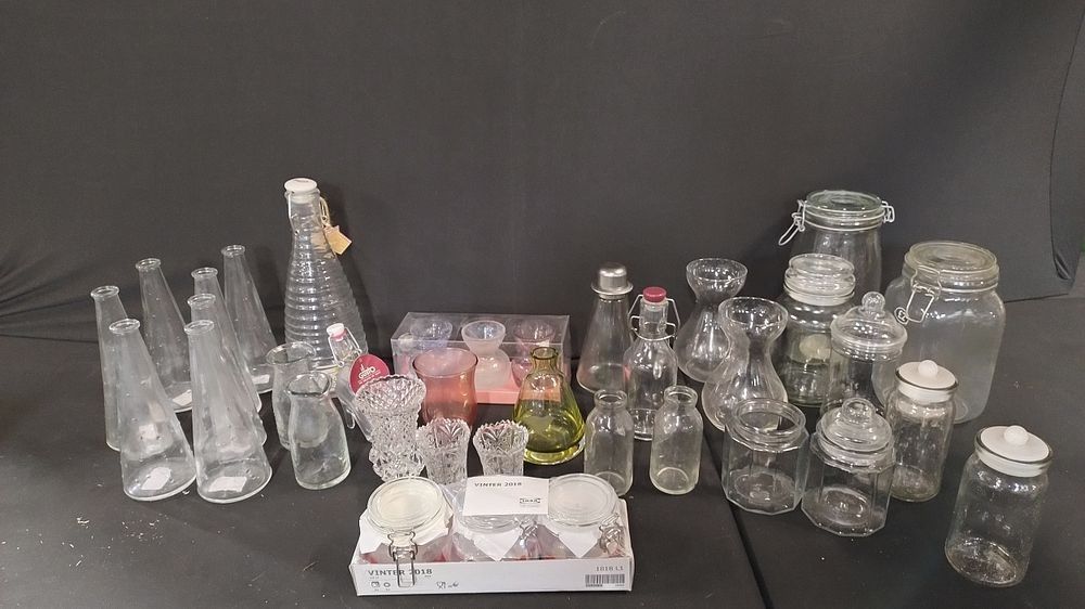 Lot 165: Various glass storage jars and vases