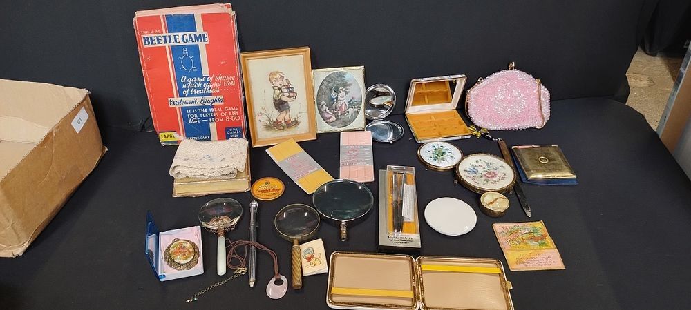 Lot 267: Selection of vintage items including compacts, lace, magnifying...