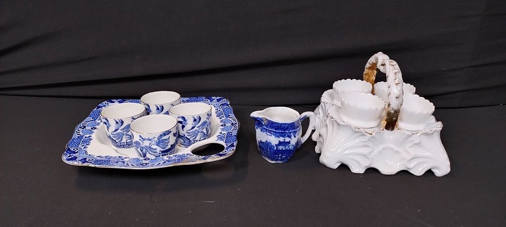 Lot 414: Burghley ware blue and white egg cruet set...