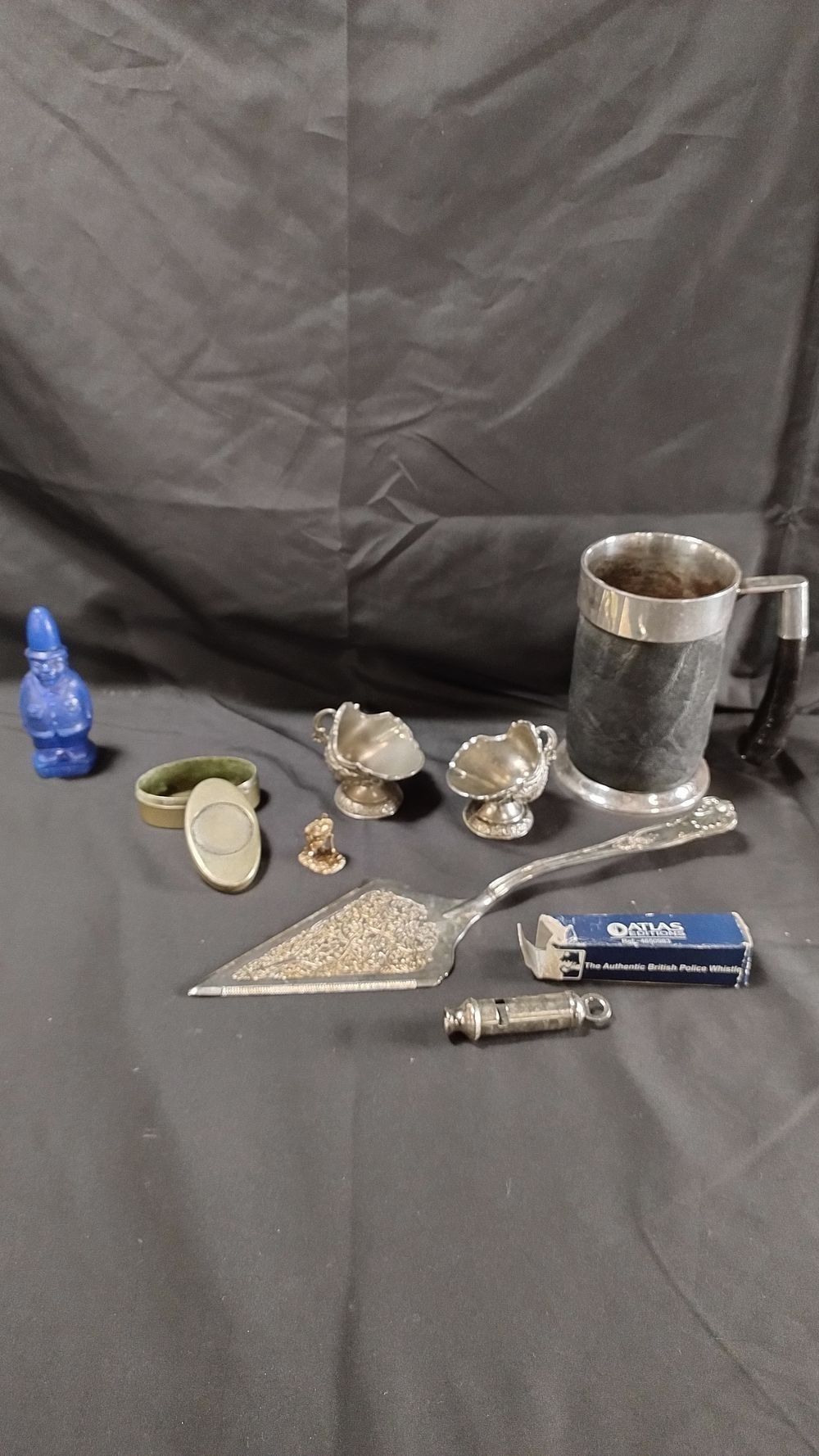 Lot 484: Number of silver plated items including police whistle,...