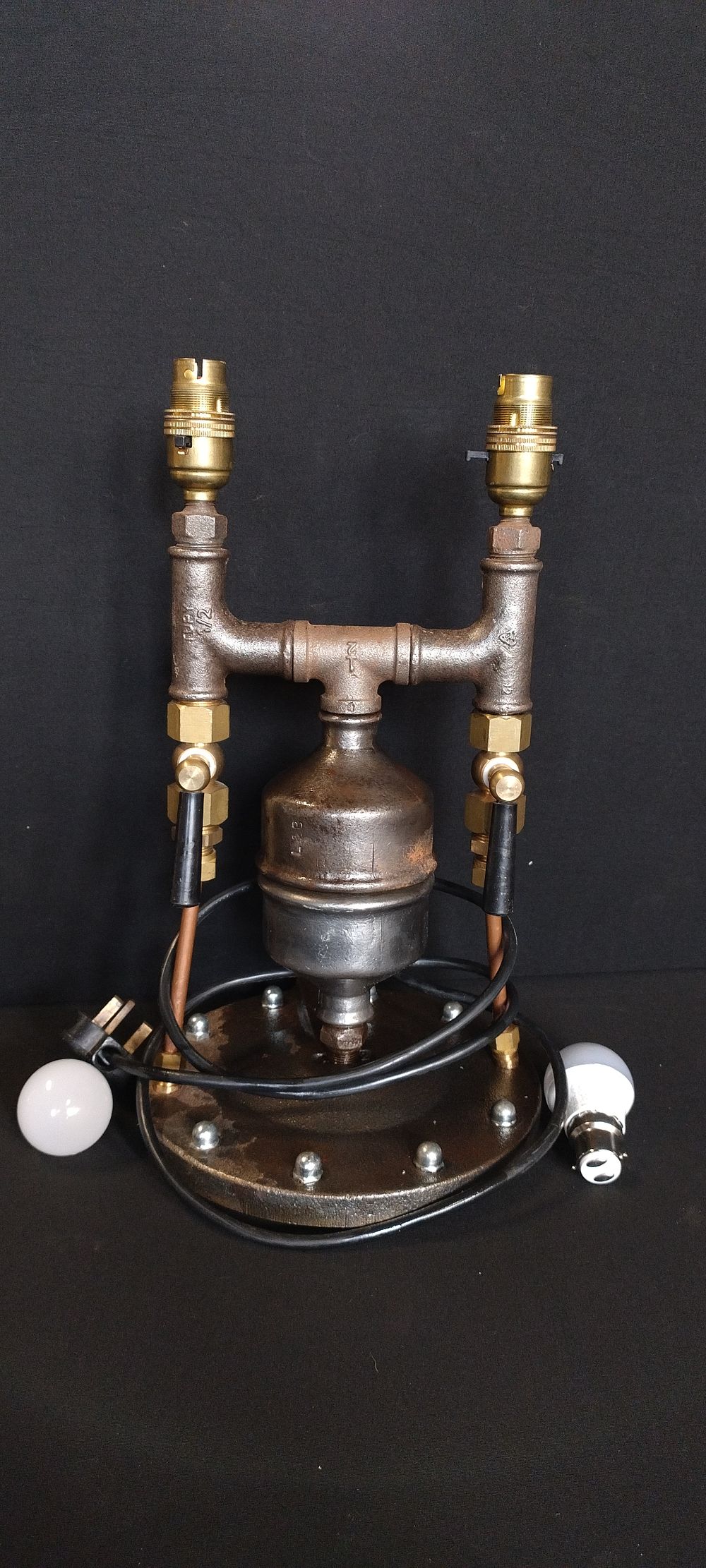 Lot 191: Steampunk style converted double lamp. Measures approx H...