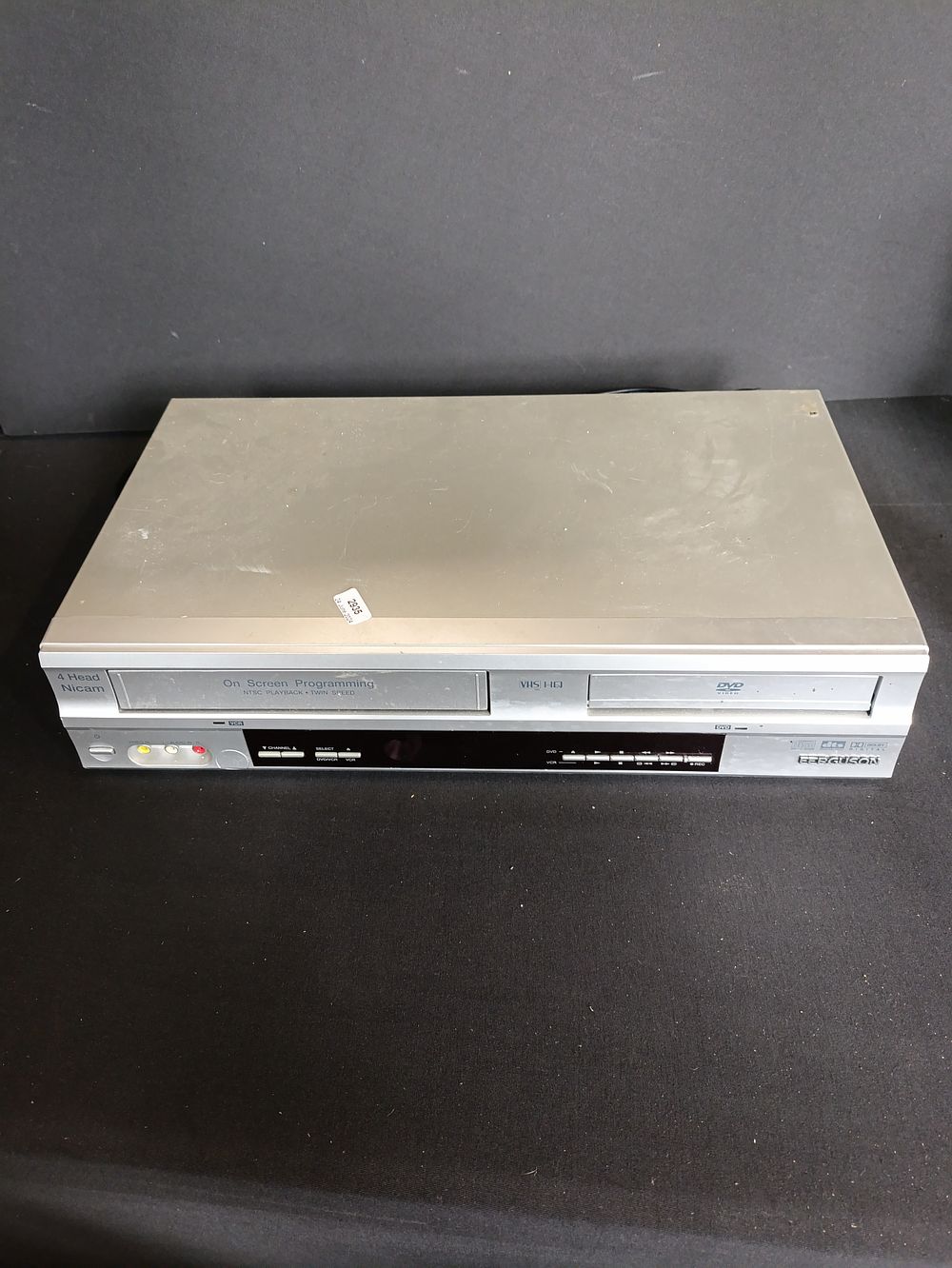 Lot 253: Ferguson FVD100-01 VCR/DVD Combi Player, tested for power.