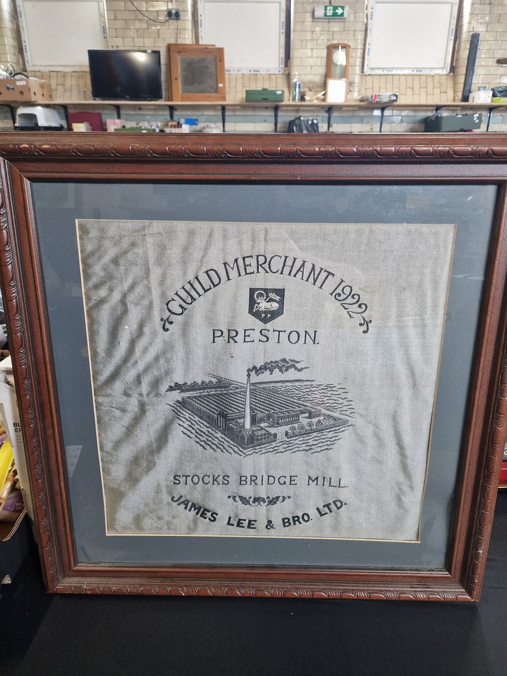 Lot 433: Vintage Framed Embroidery Advertising James Lee & Bro....