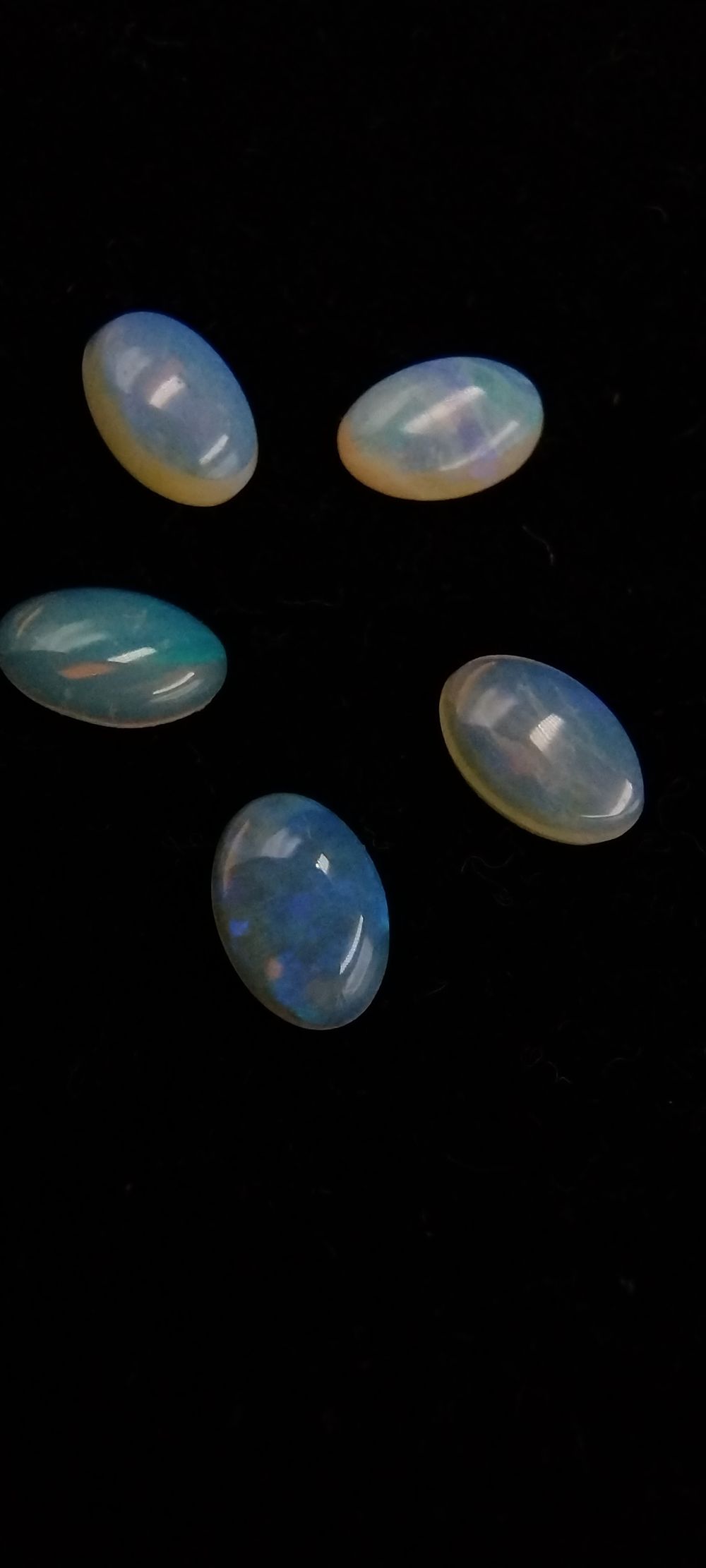 Lot 114: Five (5) Coober Pedy Polished Cabochon Oval Opals....