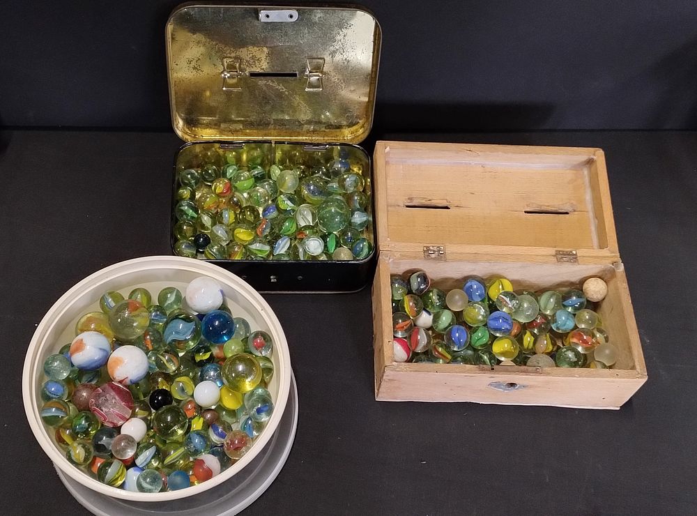 Lot 124: Collection of various vintage marbles in a tub...