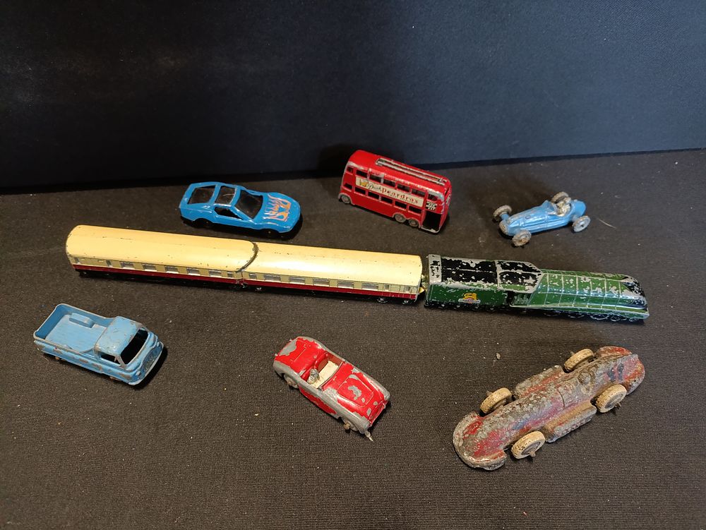 Lot 133: Selection of vintage model vehicles including Dinky train...