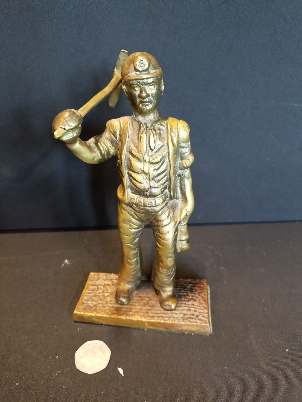 Lot 136: Solid brass coal miner figure, approximately 22cm tall