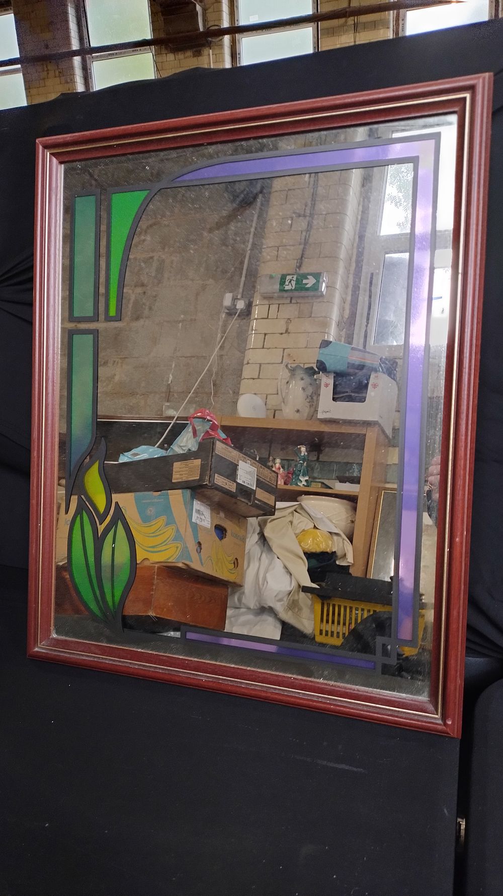 Lot 137: Stained glass effect mirror measures 21.5 x 17.5...