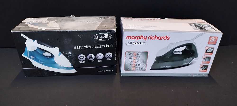 Lot 146: Two steam irons boxed, Morphy Richards Breeze and...