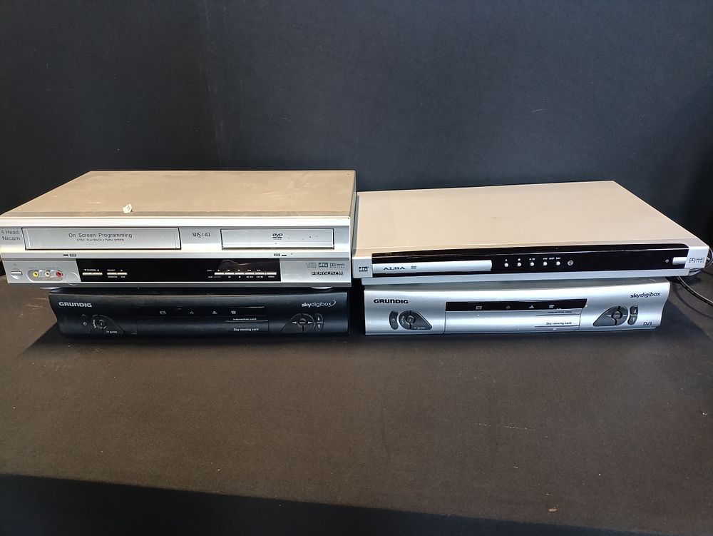 Lot 176: 2 Grundig Sky Boxes, an Alba DVD player...