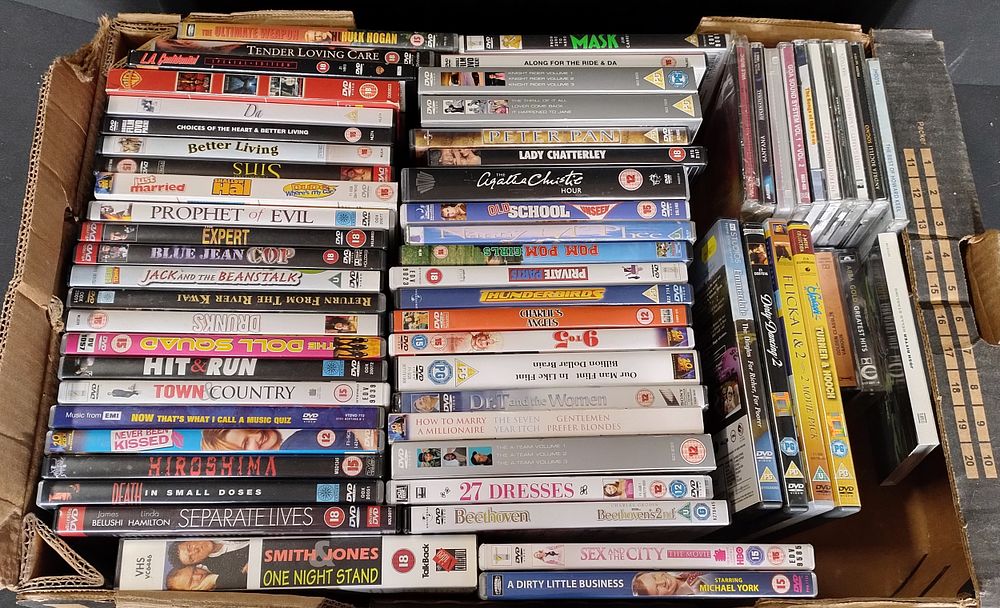Lot 217: Mixed box of dvds, CDs, and cassette tapes