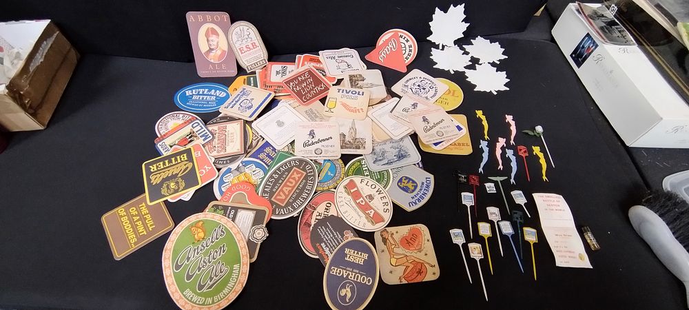 Lot 280: Mixed beer mats, vintage cocktail sticks and other...