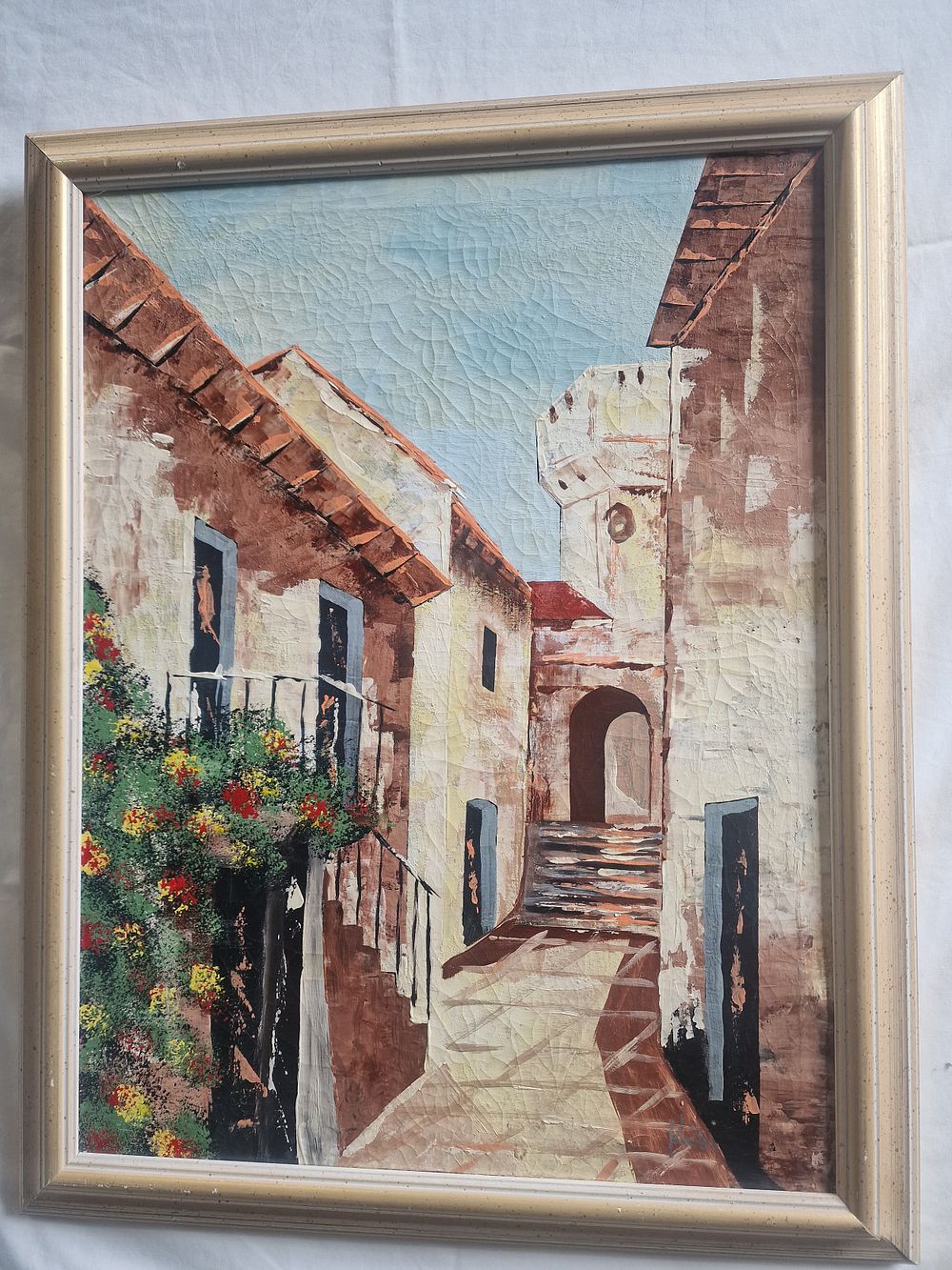 Lot 300: Hand painted impasto village scene. Signed but unknown.