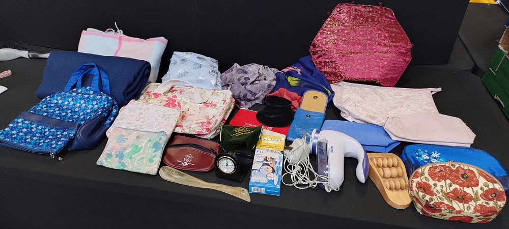 Lot 305: Mixed lot of scarves, wash bags, jewellery bags,...