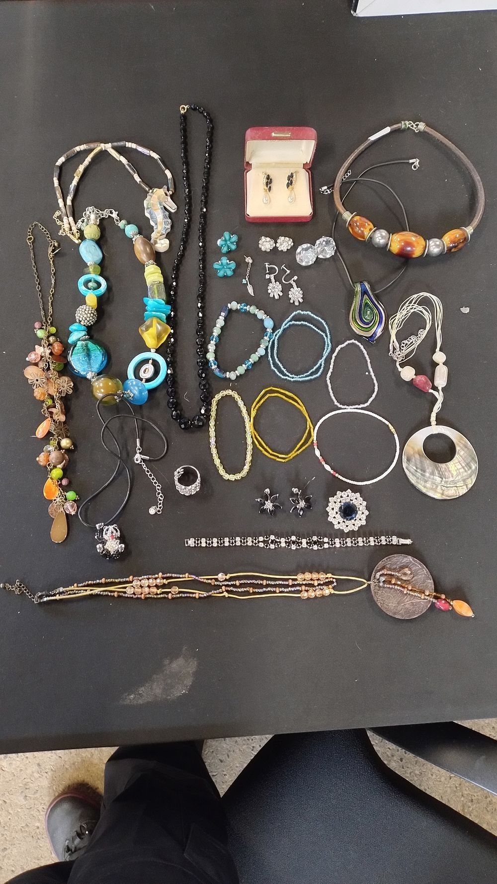 Lot 311: Bag of costume jewellery including necklaces, earrings and...