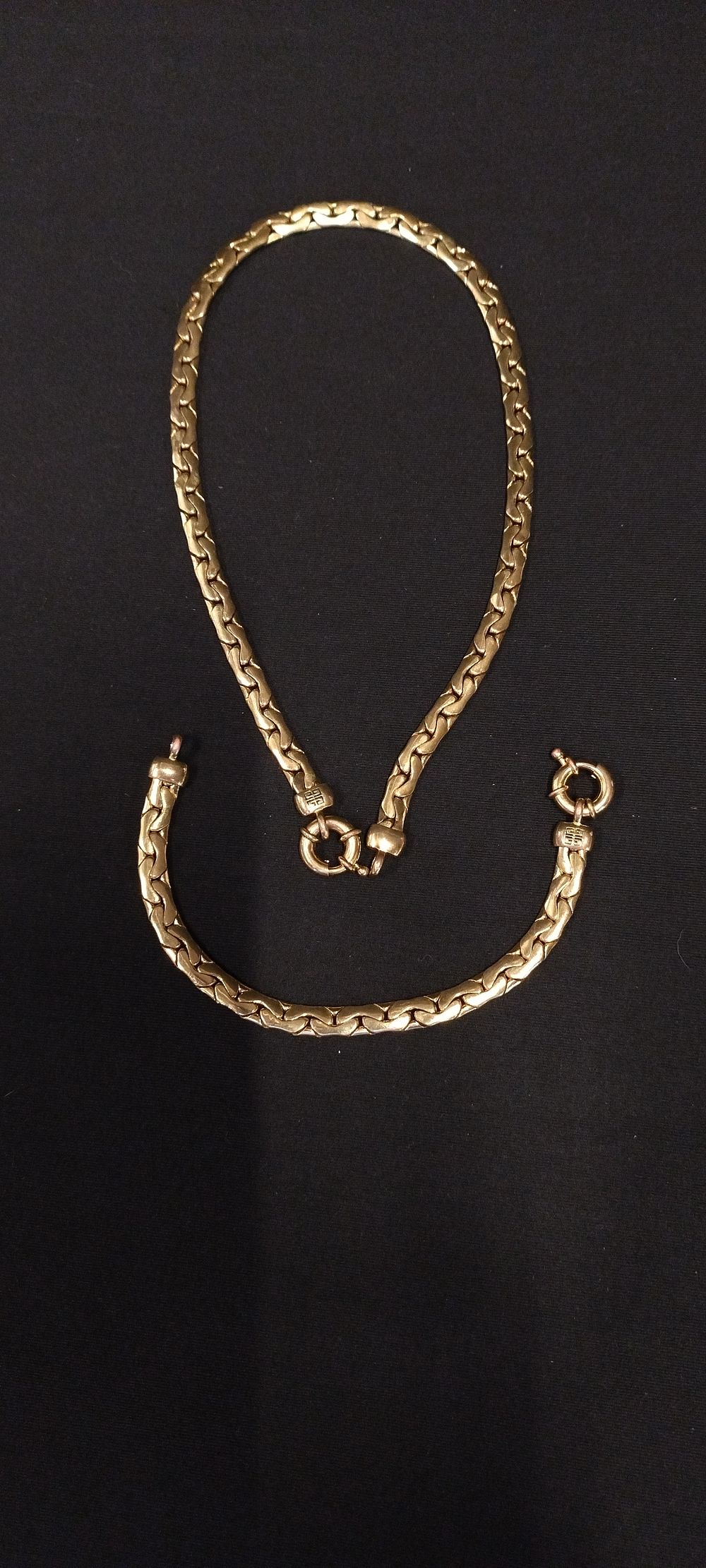 Lot 363: Givenchy Dual, gold plated Necklace and bracelet set