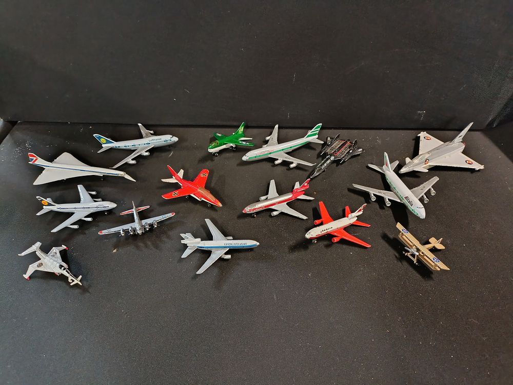 Lot 387: Selection of mostly die cast model planes including...