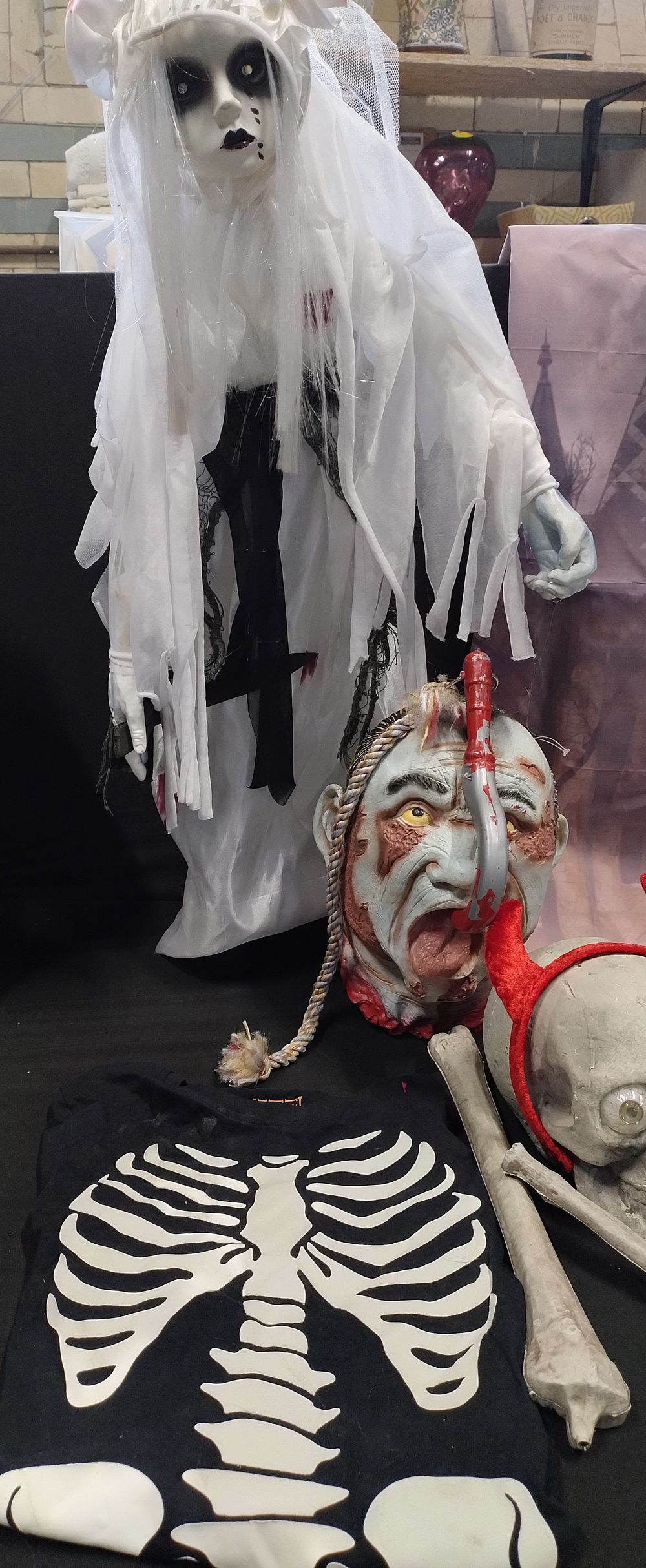 Lot 394: Selection of Halloween decorations, animatronic bride, background sheet,...