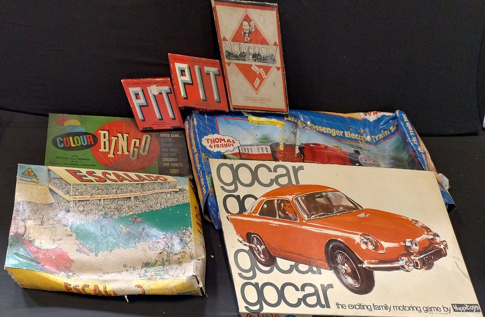 Lot 408: Collection of vintage games including gocar, escalado,colour bingo...