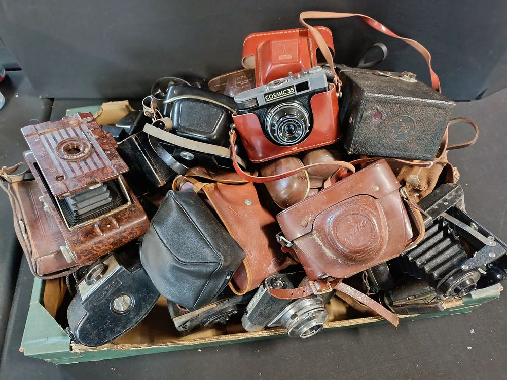 Lot 430: Large box of vintage cameras including Kodak, Cosmic,...