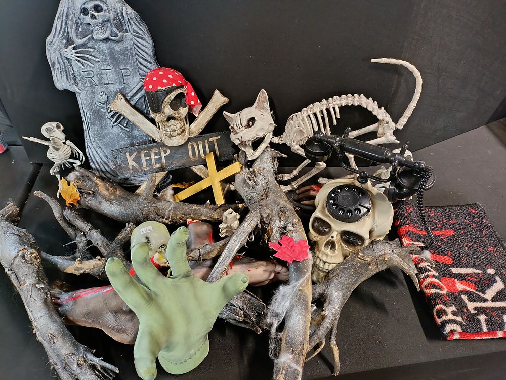 Lot 450: Selection of Halloween decorations including an animated Thing...