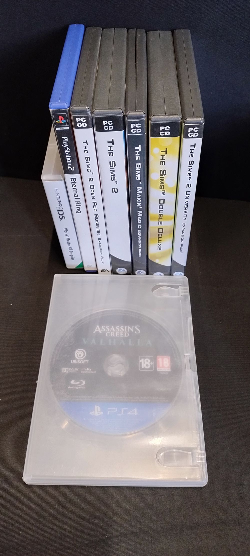 Lot 215: Five Sims pc games, Nintendo DS Wario master...