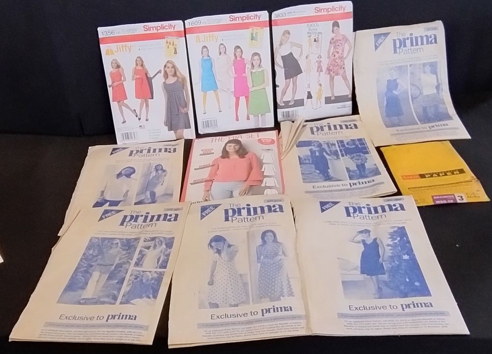 Lot 233: Collection of 10 vintage clothes patterns by Prima....