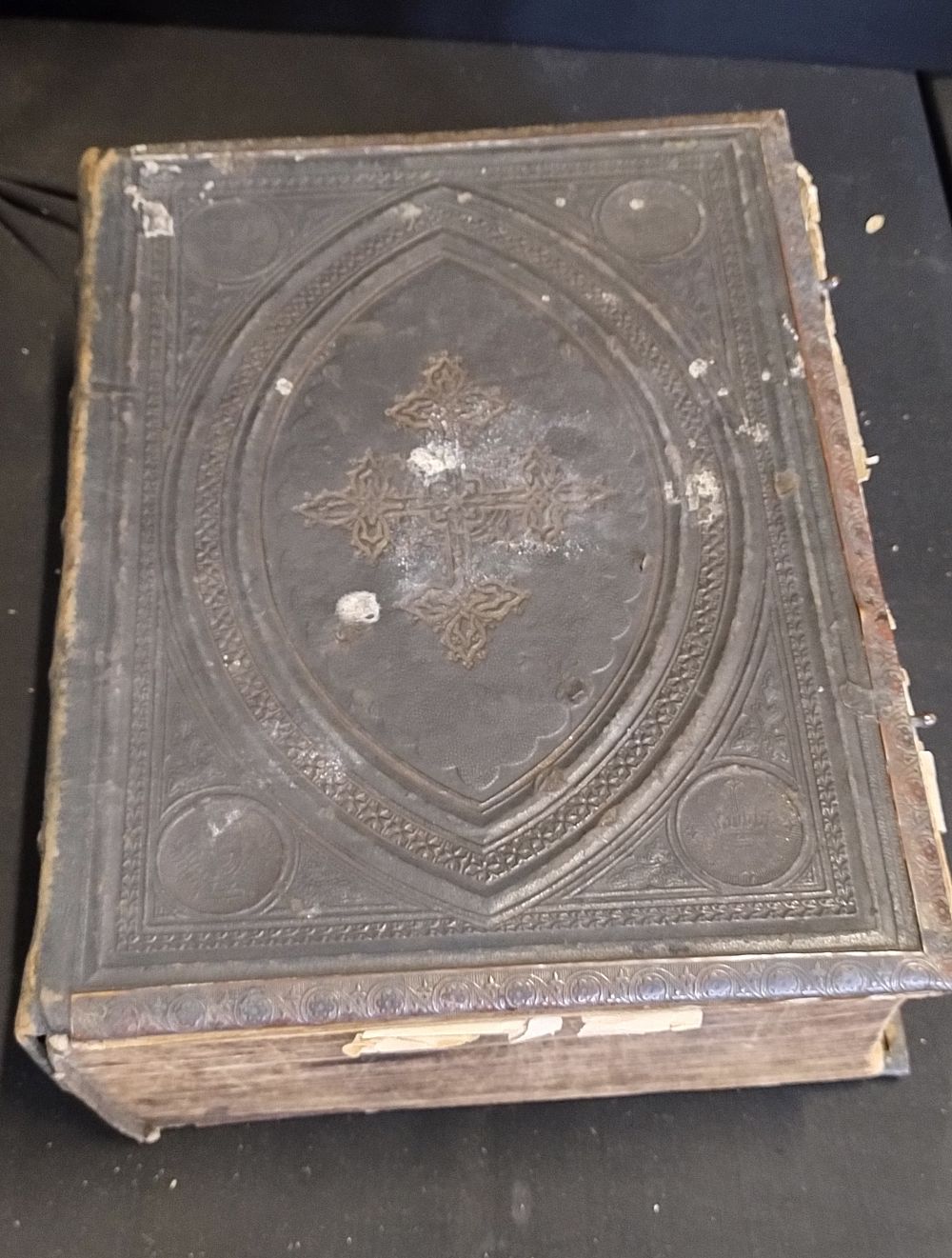 Lot 243: Brass edged bible from the 1900's. Embossed front...