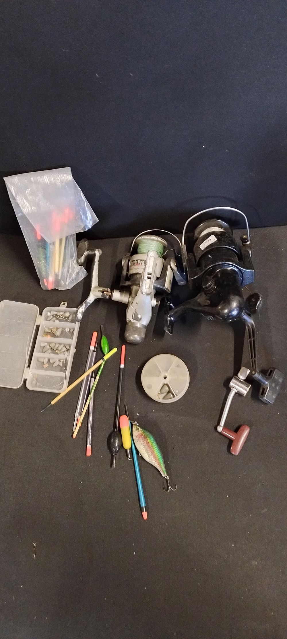 Lot 249: Selection of fishing equipment including two fishing reels.A...