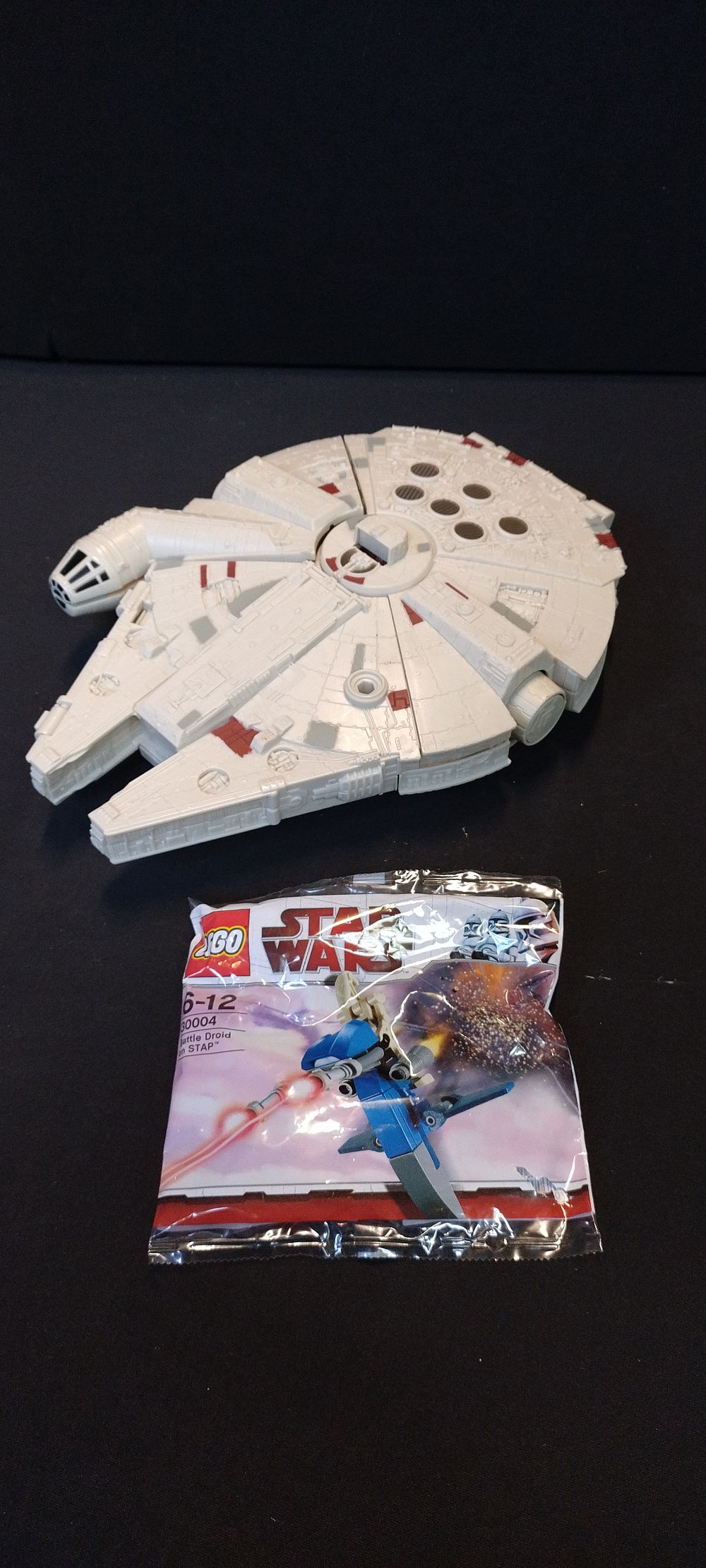 Lot 275: Micro machines star wars millennium falcon and a...