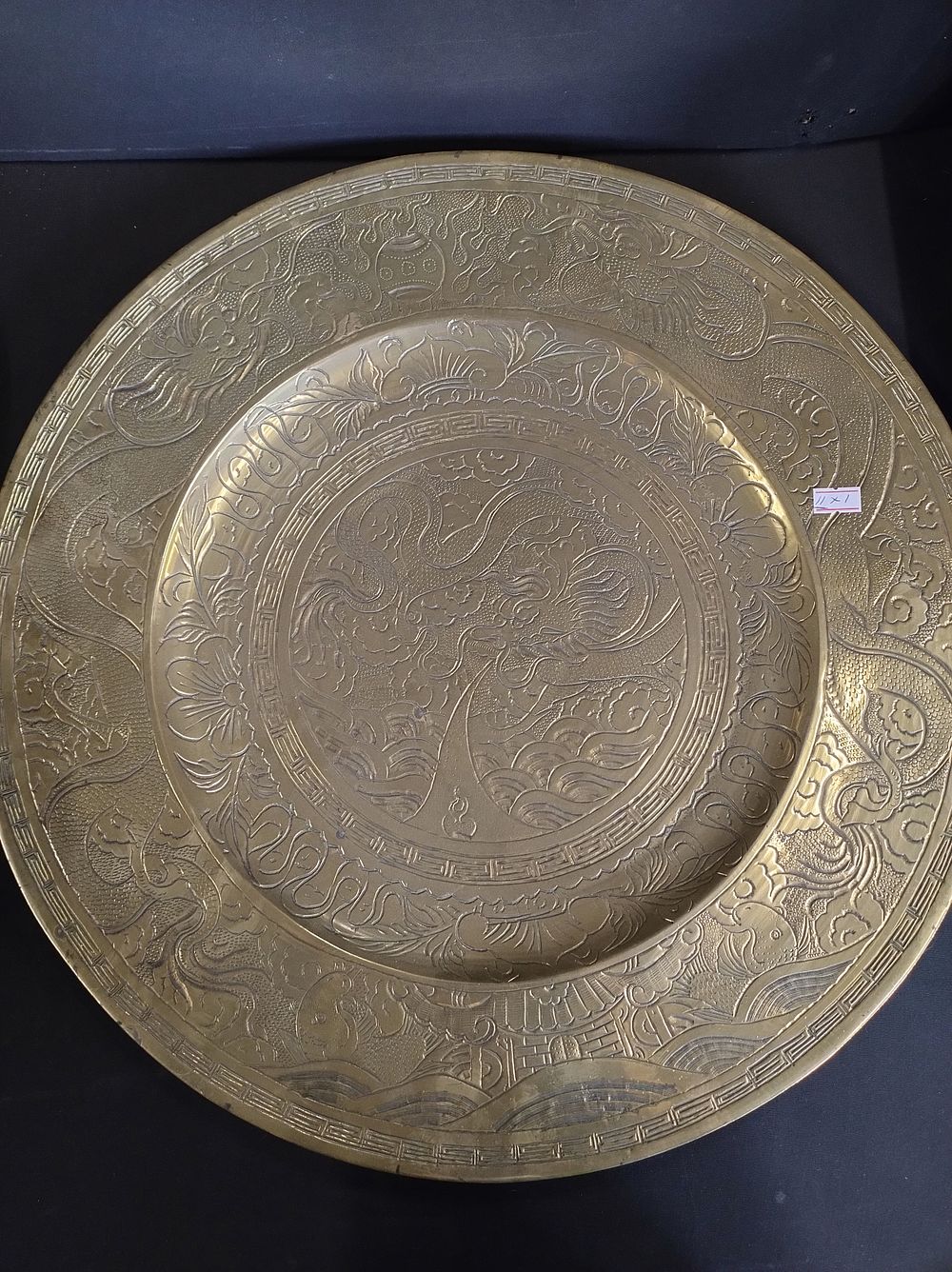 Lot 305: Early 20th Century Large Chinese brass charger engraved...