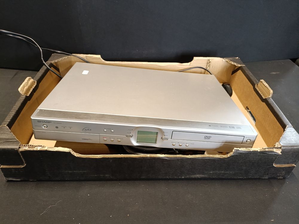Lot 326: Sharp DV-HR300 DVD/HDD recorder tested for power