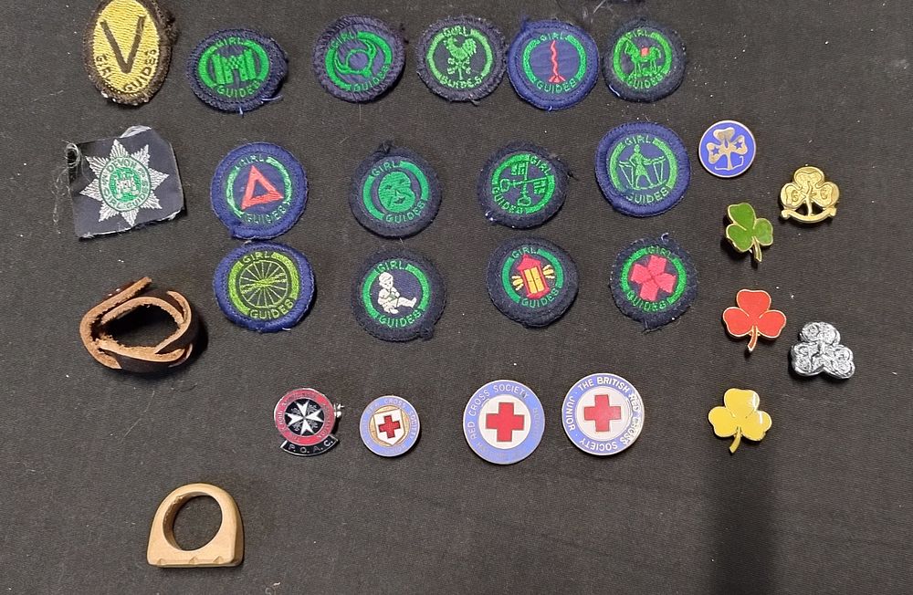 Lot 343: Collection of girl guides sew on badges, pin...