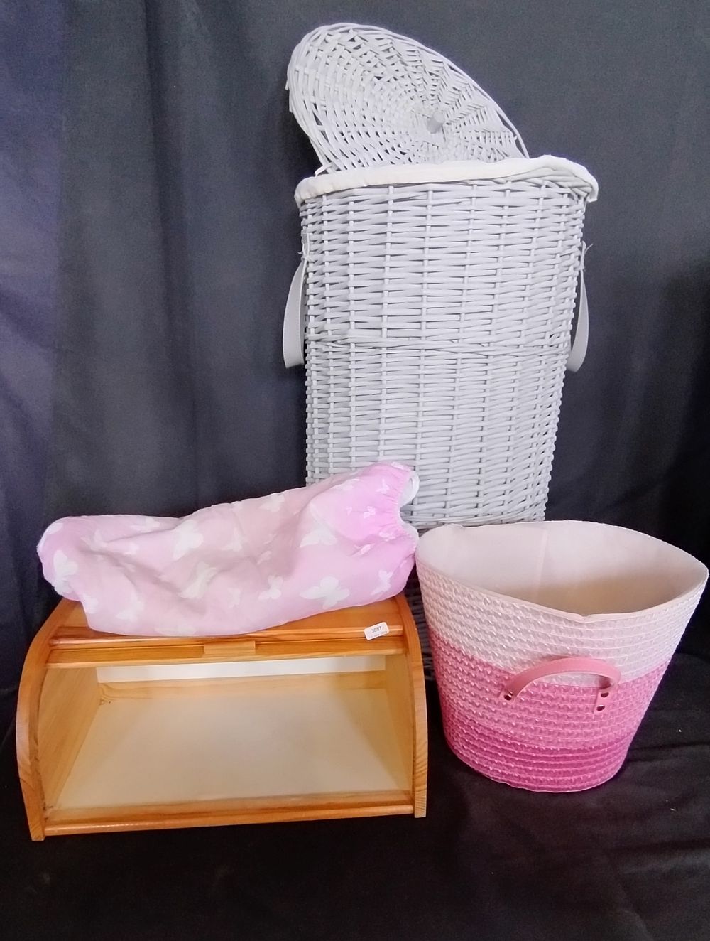 Lot 369: Grey wicker laundry basket, wooden bread bin, ironing...
