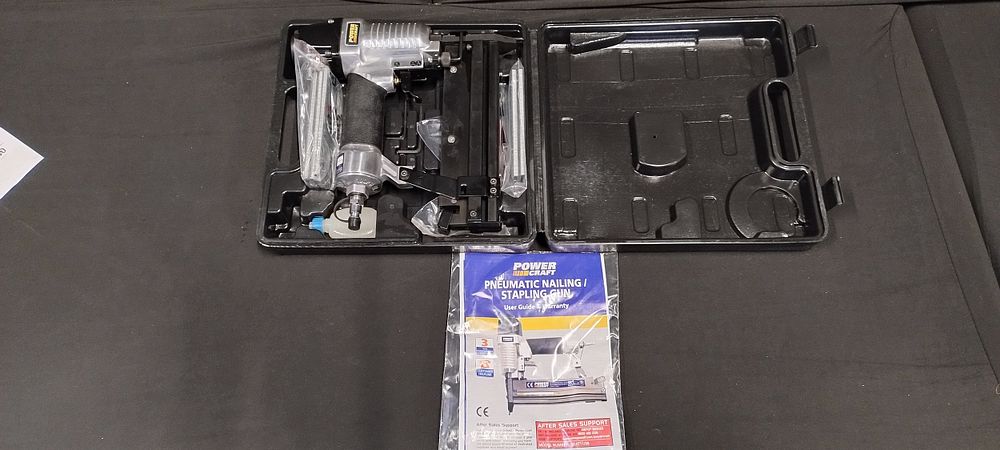 Lot 410: Power craft Pneumatic Nailing Gun complete with staples...