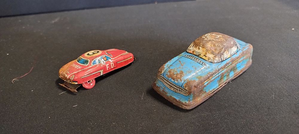 Lot 316: Two vintage vehicles, Fire dept litho tin toy....