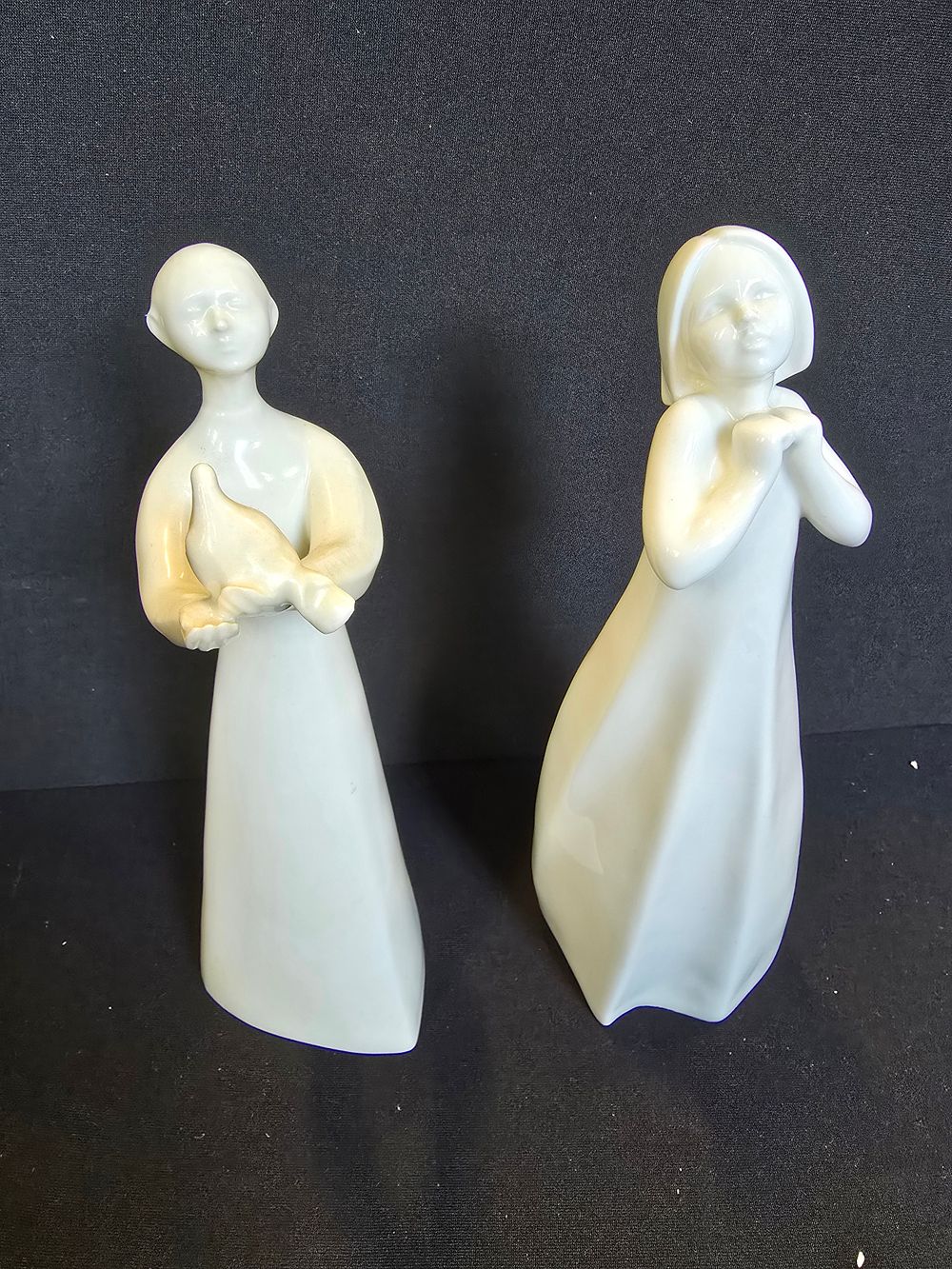 Lot 417: Two Royal Doulton Figurines in white. Peace and...