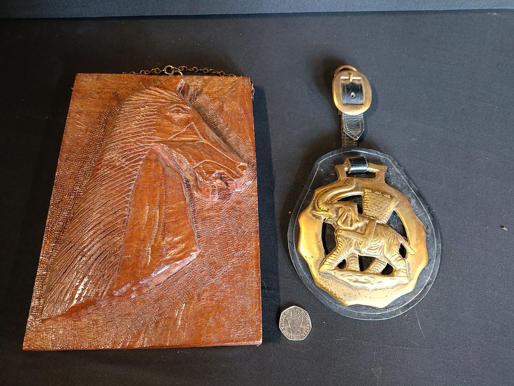 Lot 472: Carved wooden horse head on wooden plaque Approximately...