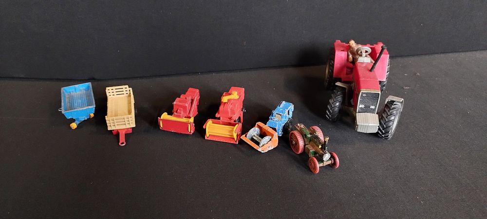 Lot 493: Vintage diecast farm vehicles and trailers
