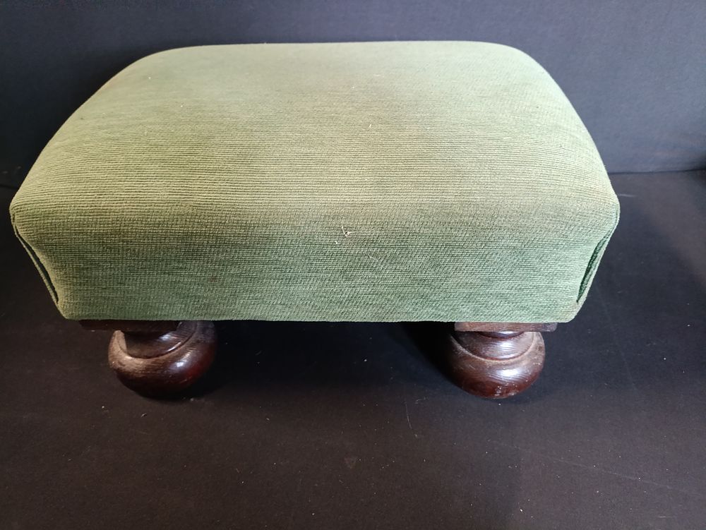 Lot 496: Small green fabric foot stool with wooden feet...