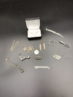 Selection of mostly sterling silver jewellery including necklaces, pendants, earrings and more