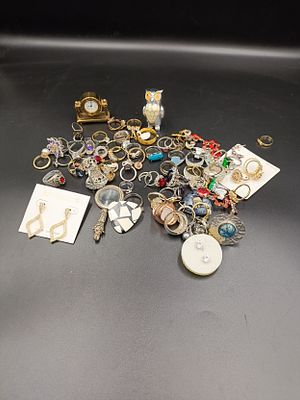 Large selection of jewellery including mostly rings with some earrings and sterling silver.