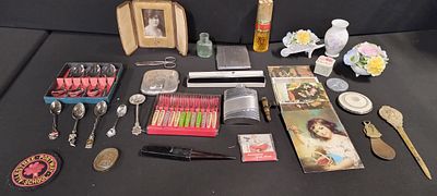 Various vintage items including folding photograph frame, pickle forks, spoons and other items