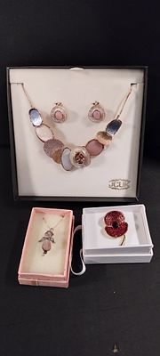 Costume jewellery, necklaces and earrings set and a poppy brooch and a angel necklace