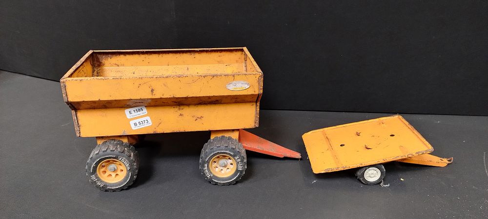 Lot 155: Vintage Tonka farm Trailer and pressed metal jeep...