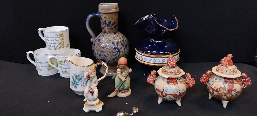 Lot 157: Two vintage satsuma lidded temple jars with foo...