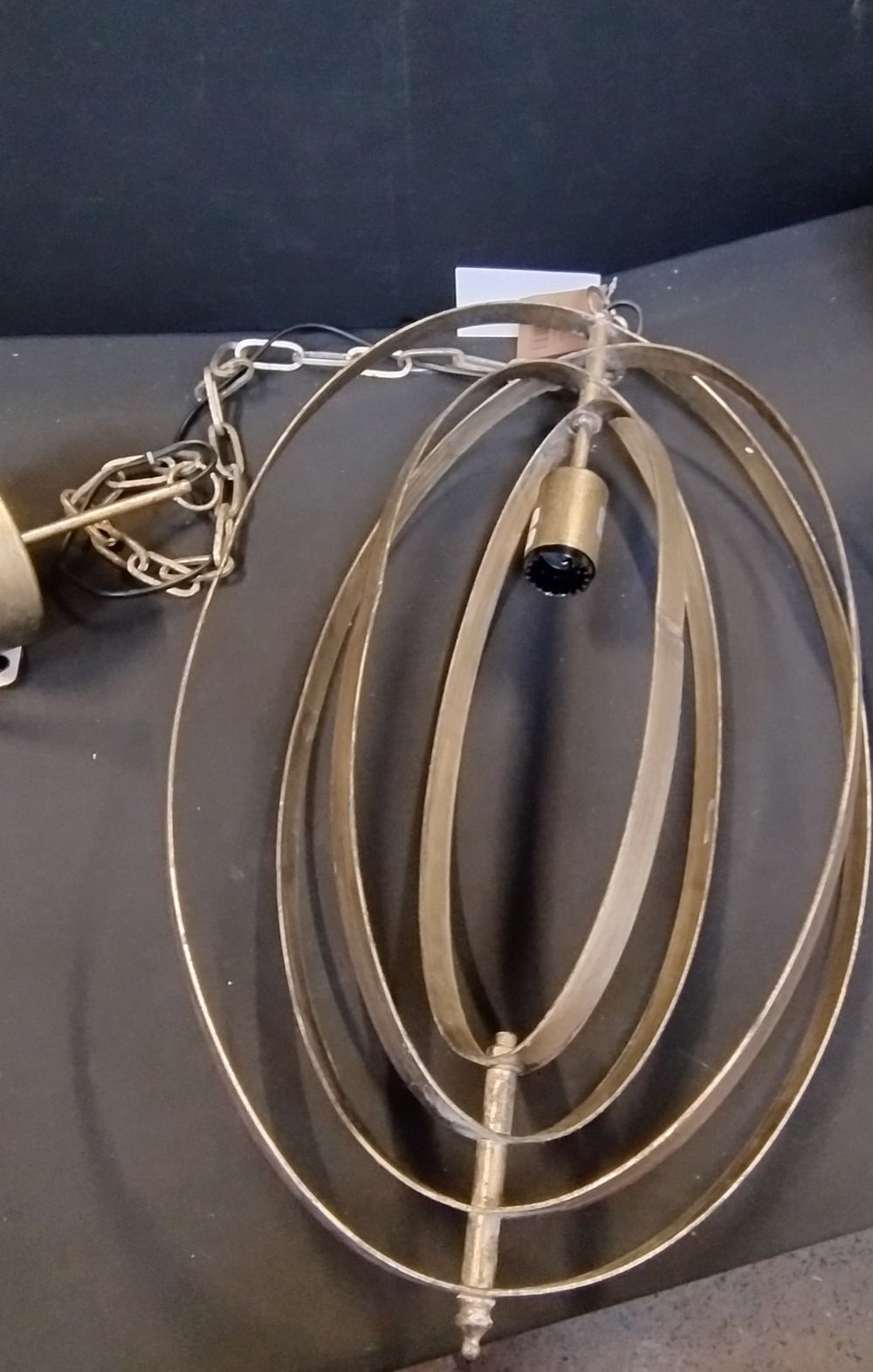 Lot 159: Bronze Gyroscopic ceiling pendant light
