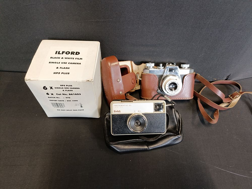 Lot 177: Selection of vintage cameras and equipment including Kodak...