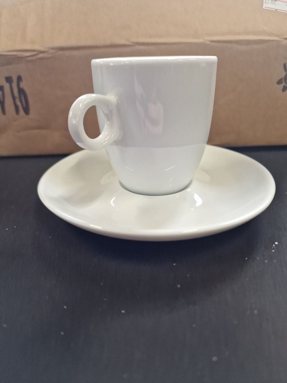 Lot 189: A set of six white espresso cups and...