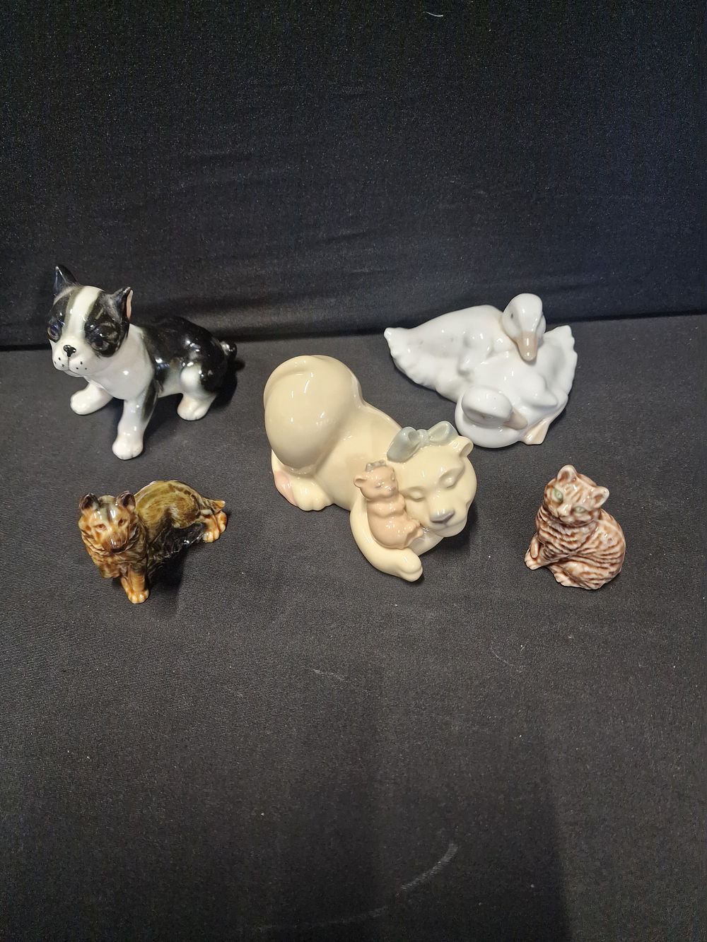 Lot 194: Selection of pottery including Nao by Lladro, Wade...